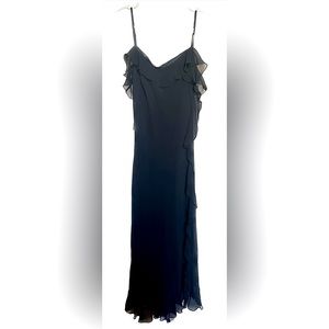 Warehouse size 8. 100% silk. Black ruffle midi dress